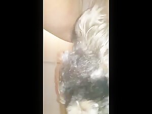 Bestiality sex video: a mature woman and a dog