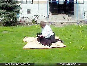 A woman and her dog in a beastly video