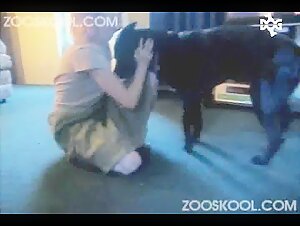 Bestial sex video with a blonde and her dog