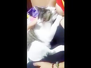 Woman caring for wild cat in extreme bestiality sex scene