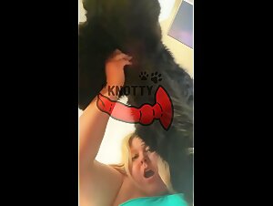 Brunette fucks her dog while the couple relaxes!