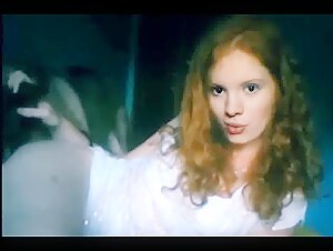 Amateur video of bestiality: a red-haired woman and her dog